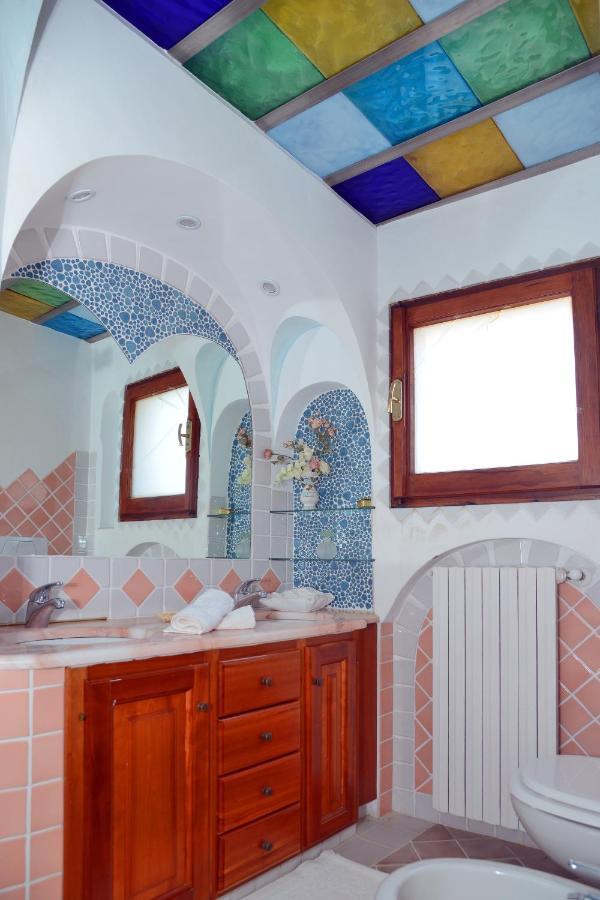 Case Vacanze La Conia Cannigione Habitación foto